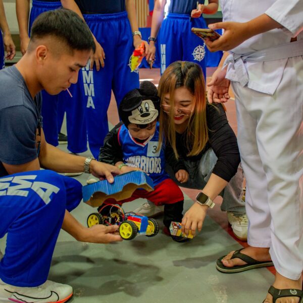 MMMA Family Day 2024 Celebrates Unity and Joy - Child playing with toy